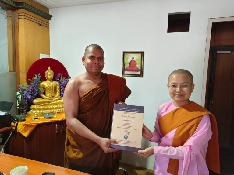 1. Ven. Daw Yasanandi submitted her Ph.D Thesis to the Director, Mahabohdi Research Centre